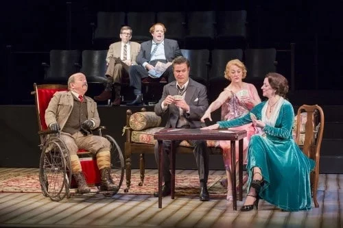 The cast of The Real Inspector Hound, written by Tom Stoppard and directed by Michael Kahn. Set design by Jim Noone, costume design by Murell Horton and lighting design by Mark McCullough. February 23-March 27, 2016 on the McGuire Proscenium Stage at the Guthrie Theater, Minneapolis. Photo by Scott Suchman.