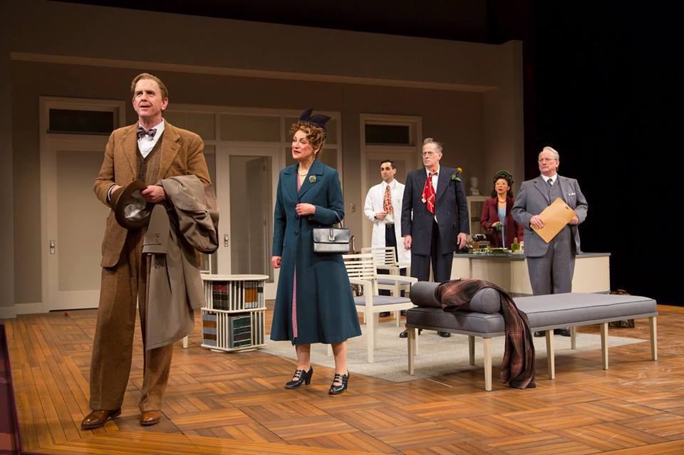 David Kelly (Elwood P. Dowd), Sally Wingert (Veta Louise Simmons), Ryan Shams (Dr. Sanderson), Steve Hendrickson (Dr. Chumley), Sun Mee Chomet (Myrtle Mae Simmons) and Michael J. Hume (Judge Omar Gaffney) in the Guthrie Theater’s production of Harvey, by Mary Chase and directed by Libby Appel. Scenic design by William Bloodgood, costume design by Deborah M. Dryden, lighting design by Xavier Pierce. April 9 – May 15, 2016 on the Wurtele Thrust Stage at the Guthrie Theater, Minneapolis. Photo by T. Charles Erickson.